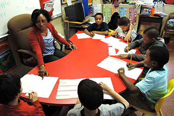Teacher with students in group instruction - Special Education Bloomfiled NJ