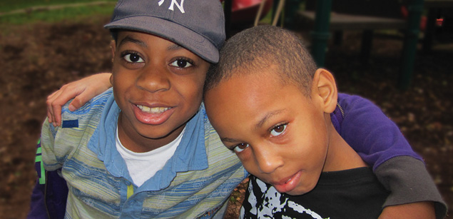 Special education school - 2 male students together on playground - Bloomfield NJ - Westbridge Academy