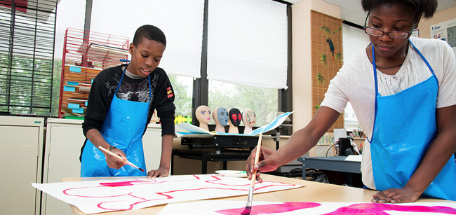 Female student working on large scale art project - Private Special Education School, Bloomfield, NJ