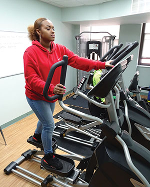 Female high school student on treadmill at Westbridge Academy