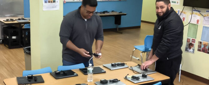 Westbridge Academy staff preparing devices for students working remotely