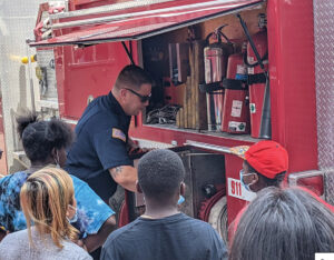 Bloomfield Fire Department staff work with Westbridge Academy students in hands-on learning activities