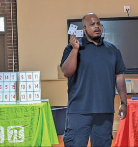 Tyrone Williams entertains Westbrideg Academy students and combines magic with science