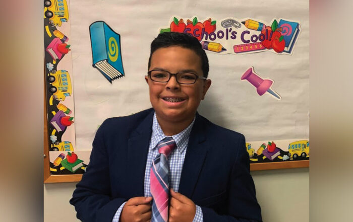 On special occasions, Mason like to dress for success and comes to school in a full suit and tie!