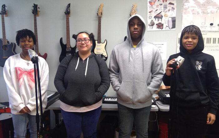 Student working on Westbridge Academy's student-generated news podcast.